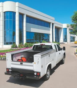 Utility-grade retractable tonneau covers protect cabling contractors&apos; truck-bed tools, gear