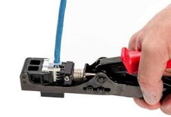 HellermannTyton's single-action jack termination tool cuts and terminates all eight wires with one squeeze of the handle. HellermannTyton's single-action jack termination tool cuts and terminates all eight wires with one squeeze of the handle.