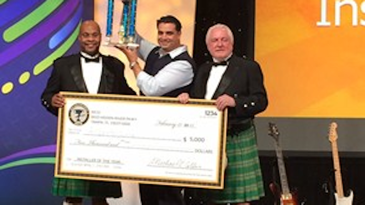 Flanked by BICSI president Michael Collins (left) and BICSI CEO/executive director John D. Clark (right), Alberto Luna hoists the trophy he earned by winning the BICSI Installer of the Year award. Luna, who won a $5,000 cash prize as Installer of the Year, previously was named the season two Cabling Icon. For that honor, he also won a cash prize in excess of $5,000 and an expenses-paid trip to the 2013 BICSI Winter Conference. It was at the 2013 Winter Conference that Luna first participated in the BICSI Cabling Skills Challenge.