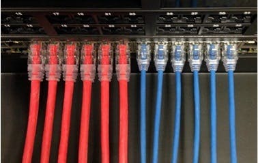 These Category 6 cables show the difference in size between 24-AWG (left/red) and 28-AWG (right/blue) twisted-pair cable. The use of 28-AWG cable will be the focus of a web seminar taking place June 4.
