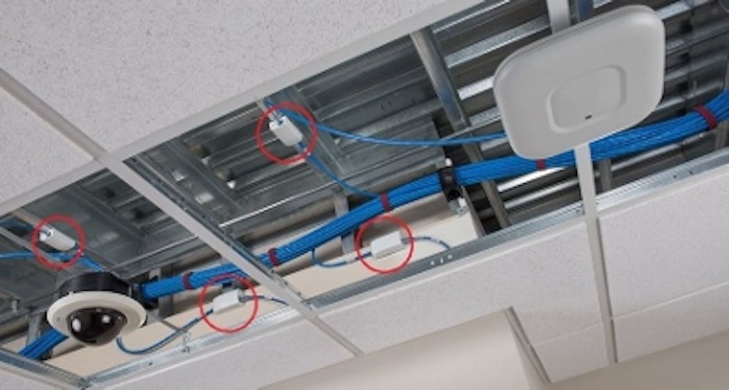 Panduit&apos;s surface mount boxes (circled) are certified to UL 2043 to deliver connectivity to in-ceiling applications, such as wireless access points (upper right) and security cameras (lower left). Photo copyright: Panduit, 2016