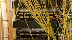 Observe the decommissioning and re-cabling of this Cisco data closet
