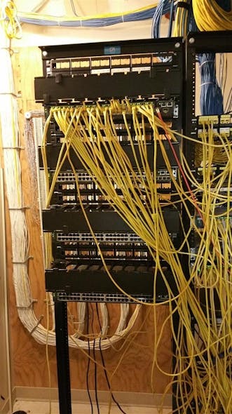 Observe the decommissioning and re-cabling of this Cisco data closet