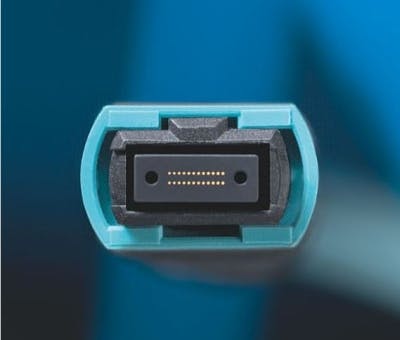 An unpinned 24-fiber MPO connector is pictured here. MPO testing can be challenging, and different test-device manufacturers take different approaches to the task.