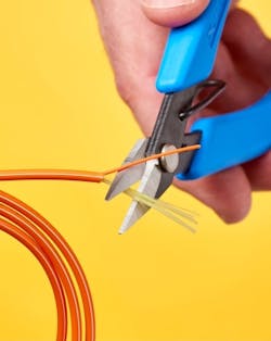 Xuron Model 9180 Kevlar Shears grip and hold, then cut the Kevlar in fiber cable. Xuron Model 9180 Kevlar Shears grip and hold, then cut the Kevlar in fiber cable.