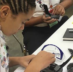 A competitor in the SkillsUSA National Telecommunications Cabling Championship. The competition was, for the 13th consecutive year, sponsored by ETA International. A competitor in the SkillsUSA National Telecommunications Cabling Championship. The competition was, for the 13th consecutive year, sponsored by ETA International.