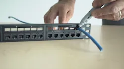 One of the attributes of Belden's REVConnect Preloaded Patch Panels is that the technician can use the space over each port to mark the cable where it should be terminated. Technicians also can use that above-the-port space to organize and dress cables, and measure the slack needed.