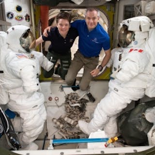 U.S. astronaut Anne McClain and Canadian astronaut David Saint Jacques pose prior to their spacewalk on April 8, 2019, during which the pair installed cables to provide additional Ethernet service to the International Space Station. Photo credit: NASA