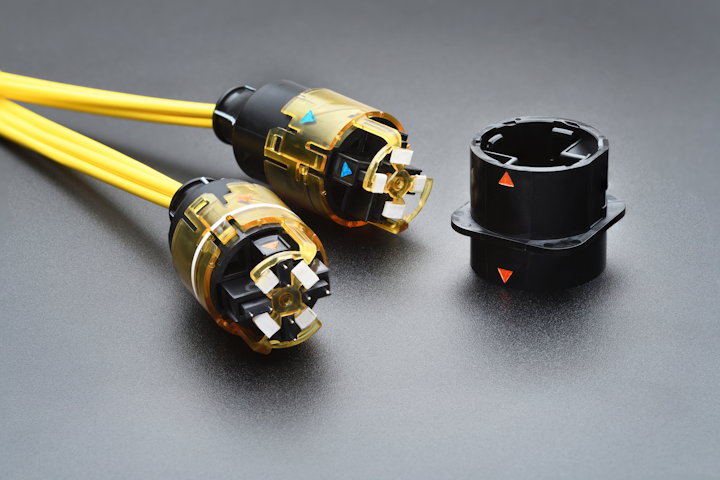 Swick Designs' SWK Connector includes a self-cleaning, self-protecting Shield Shroud. The SWK L Connector, shown here, can support up to 192 fibers.