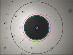 An inspection scope reveals contamination of the endface. An inspection scope reveals contamination of the endface.