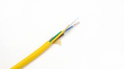 A composite cable comprises optical fibers for data and copper wires to deliver remote power. In an industrial environmental, composite cable can be used in a network of millimeter-wave 5G radios supporting a coverage zone.
