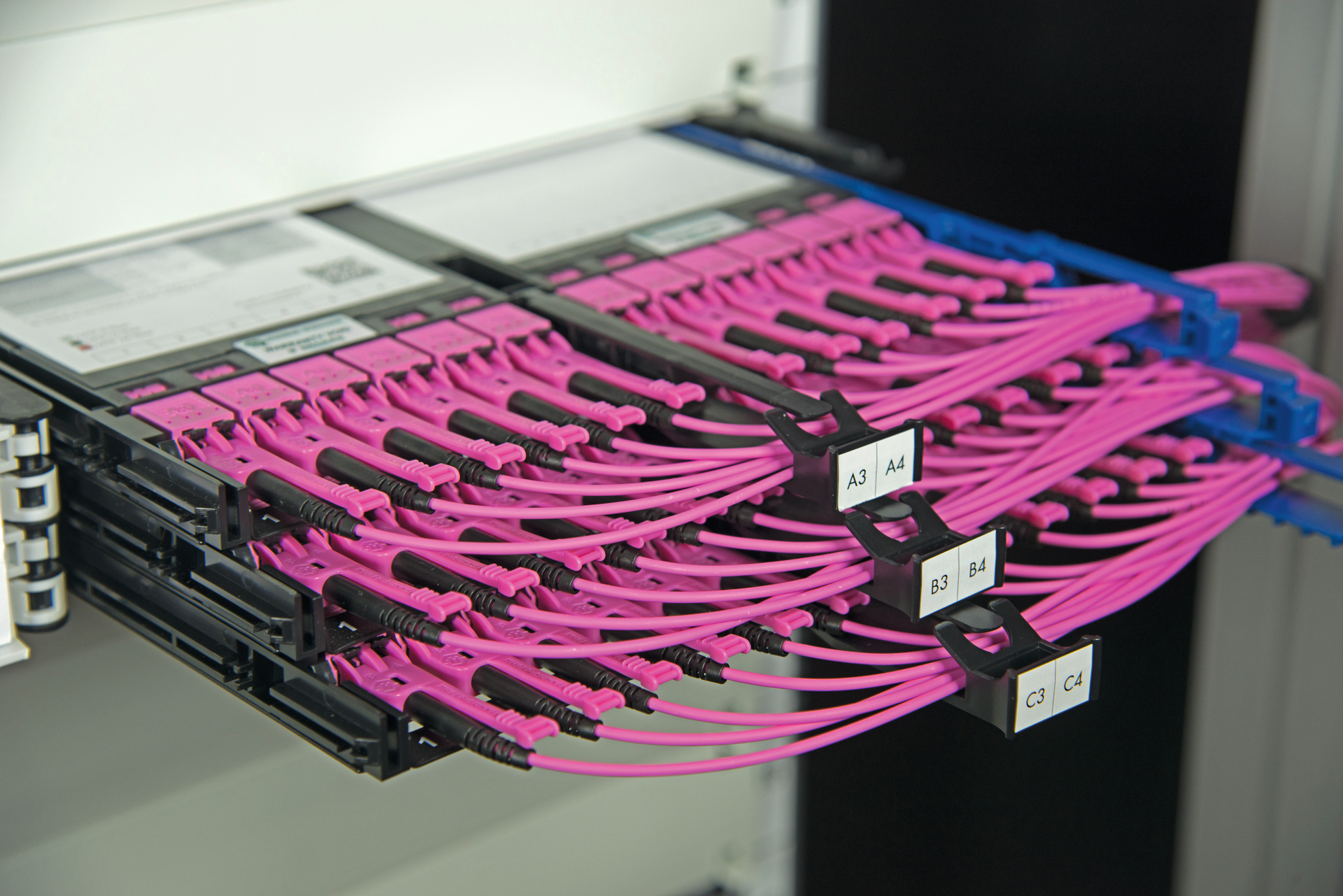 In an edge data center, it is important for a cabling solution to provide a complete, comprehensive backbone using limited space. Shown here are cassettes that are part of Huber + Suhner's LISA (Leading Interconnect System Approach), which is a high-density fiber system commonly used as a crossconnect in a data center.