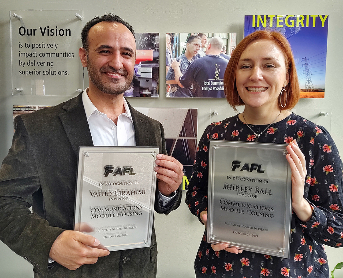 Pictured (L to R): Vahid Ebrahimi, AFL Product Development Designer; and Shirley Ball, AFL Product Development Manager. Not pictured: Artur Bueacov, AFL Hyperscale Product Design & Tooling Engineer.