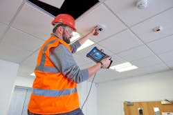 Shown here is an installer using Ideal Networks' SecuriTest IP testing system, which allows assurance that the camera is providing the video quality required and that the camera does not adversely affect bandwidth consumption. Shown here is an installer using Ideal Networks' SecuriTest IP testing system, which allows assurance that the camera is providing the video quality required and that the camera does not adversely affect bandwidth consumption.