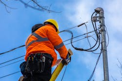 A telecommunications technician working outside, away from other individuals, is at lower risk of being exposed to Covid-19 than workers in many other environments.