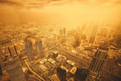 Gold-hued city skyline, Dubai, UAE Gold-hued city skyline, Dubai, UAE