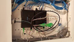 Within both Pitman Hall and the Daphne Cockwell Complex, Tellabs optical network terminals terminate singlemode fiber at device locations and provide standards-based G-PON with gigabit-speed connectivity, including Power over Ethernet. Within both Pitman Hall and the Daphne Cockwell Complex, Tellabs optical network terminals terminate singlemode fiber at device locations and provide standards-based G-PON with gigabit-speed connectivity, including Power over Ethernet.