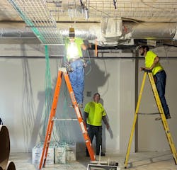The cabling installation crew had about 18 inches, or less, of plenum space to work within—much of which was taken up with 12-inch HVAC ducts. The cabling installation crew had about 18 inches, or less, of plenum space to work within—much of which was taken up with 12-inch HVAC ducts.
