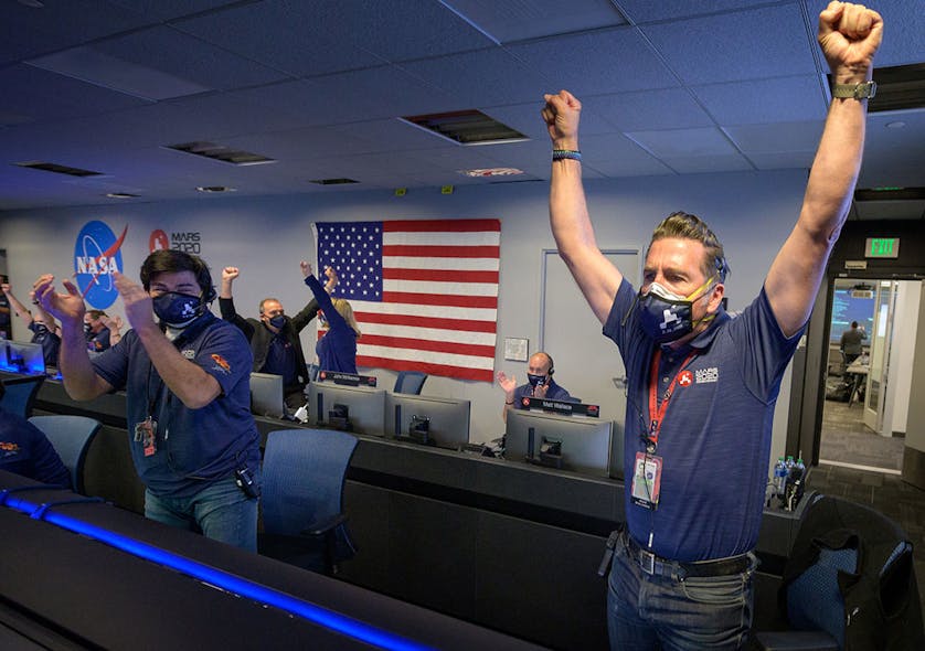 Members of NASA&rsquo;s Perseverance rover team react in mission control after receiving confirmation the spacecraft successfully touched down on Mars, Thursday, Feb. 18, 2021, at NASA&rsquo;s Jet Propulsion Laboratory in Pasadena, California.
