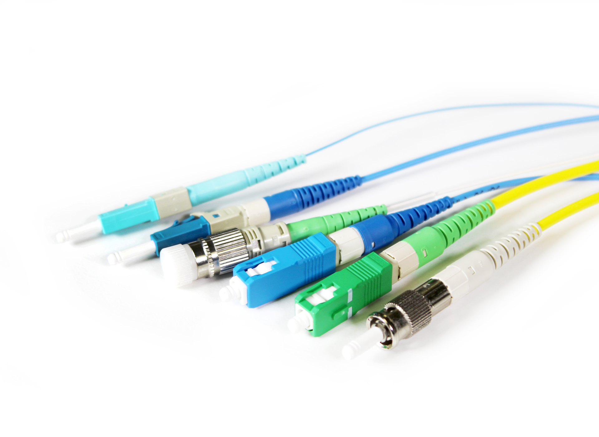 Splice-on connectors are available in several styles from multiple suppliers. Shown here are connectors in Sumitomo Electric Lightwave&rsquo;s Lynx CustomFit 2 product line, which includes SC, LC, FC, and ST styles.