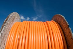 A fiber-optic cable reel. A fiber-optic cable reel.