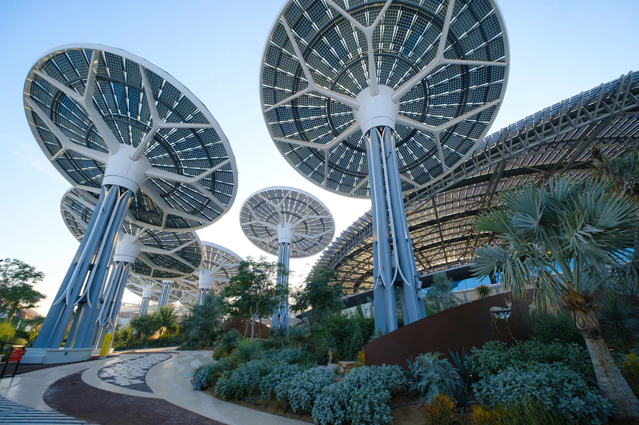 Eighteen solar energy “trees” in the garden rotate to follow the path of the sun, totaling nearly 5000 solar panels and generating 4 gigawatt hours of electricity a year. Eighteen solar energy “trees” in the garden rotate to follow the path of the sun, totaling nearly 5000 solar panels and generating 4 gigawatt hours of electricity a year.