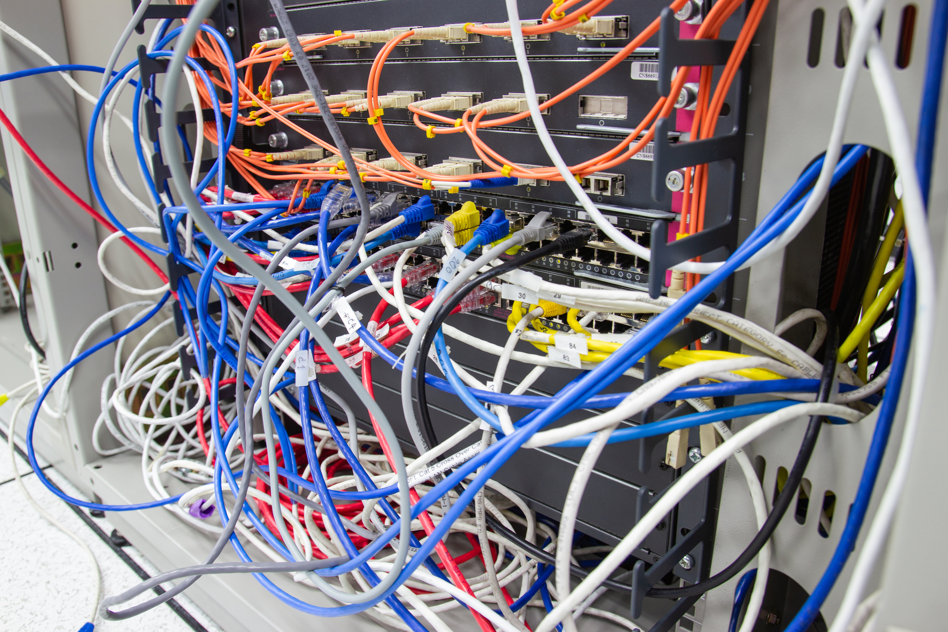 Bangkok Thailand :- Dec 10, 2019 :- Server room cable tangled [by] poorly routed cables.