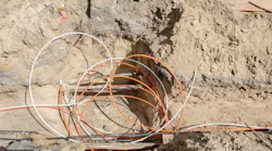Installation of fiber-optic cables for telecommunications.