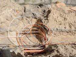 Installation of fiber-optic cables for telecommunications.
