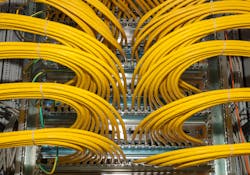 Network patch panel in a data center. Network patch panel in a data center.