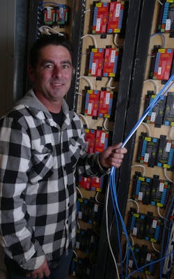Shane Slater, owner of SBS Group, LLC, who worked with the SDS team to connect and commission each node, centralized the location of all the nodes needed for PoE on the first floor on a backboard and connected them to the Digital Electricity™ system from VoltServer™ Shane Slater, owner of SBS Group, LLC, who worked with the SDS team to connect and commission each node, centralized the location of all the nodes needed for PoE on the first floor on a backboard and connected them to the Digital Electricity™ system from VoltServer™