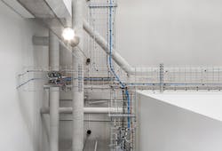 Working within an open ceiling concept required neat, organized cabling to the PoE lighting nodes to maintain aesthetics. Working within an open ceiling concept required neat, organized cabling to the PoE lighting nodes to maintain aesthetics.