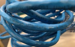 Among a long string of identifying marks printed on the cable jacket is the word PLENUM. Among a long string of identifying marks printed on the cable jacket is the word PLENUM.