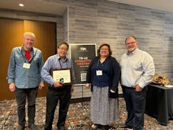 Jonathan Jew, second from left, receives the TIA's Lifetime Achievement Award during the TR-42 Committee meeting held June 3-7, 2024. Jonathan Jew, second from left, receives the TIA's Lifetime Achievement Award during the TR-42 Committee meeting held June 3-7, 2024.