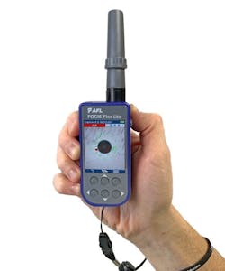 Technician holding AFL FOCIS Flex Lite in one hand Technician holding AFL FOCIS Flex Lite in one hand