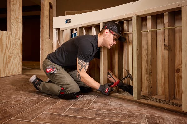 Worker Wearing Bump Cap in Confined Space