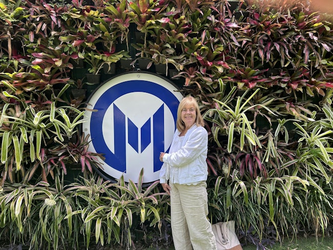 Carol Everett Oliver stands outside Moffit Cancer Center in Tampa, FL on June 11, 2025—the day she was declared cancer-free.