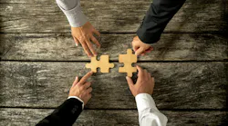 hands with puzzle pieces